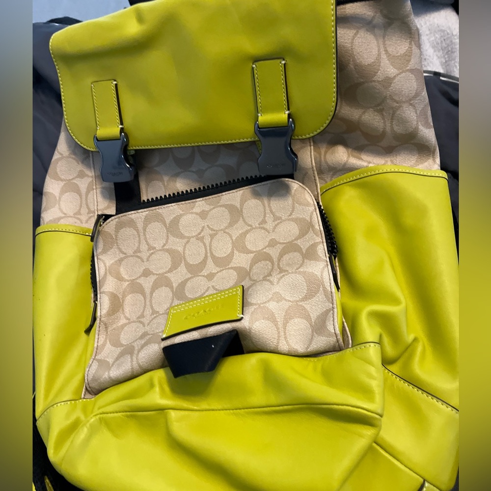 Lime green and tan Coach backpack